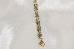 Bransoletka z żółtego i białego złota 04h